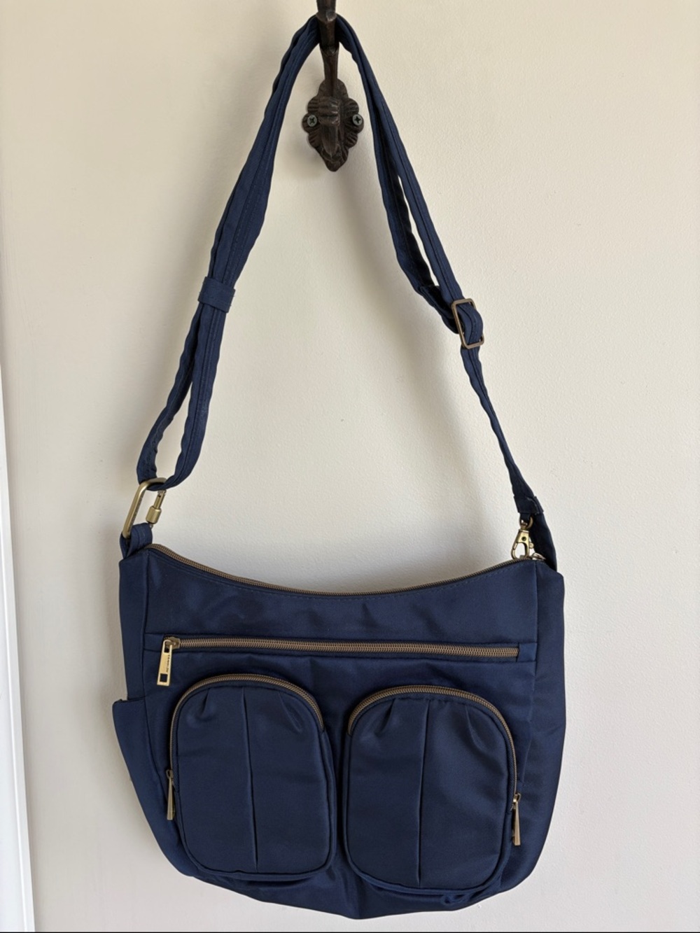 Travelon Ani-Theft Signature Twin Pocket Nobo Bag in Navy Blue with Purple Liner
